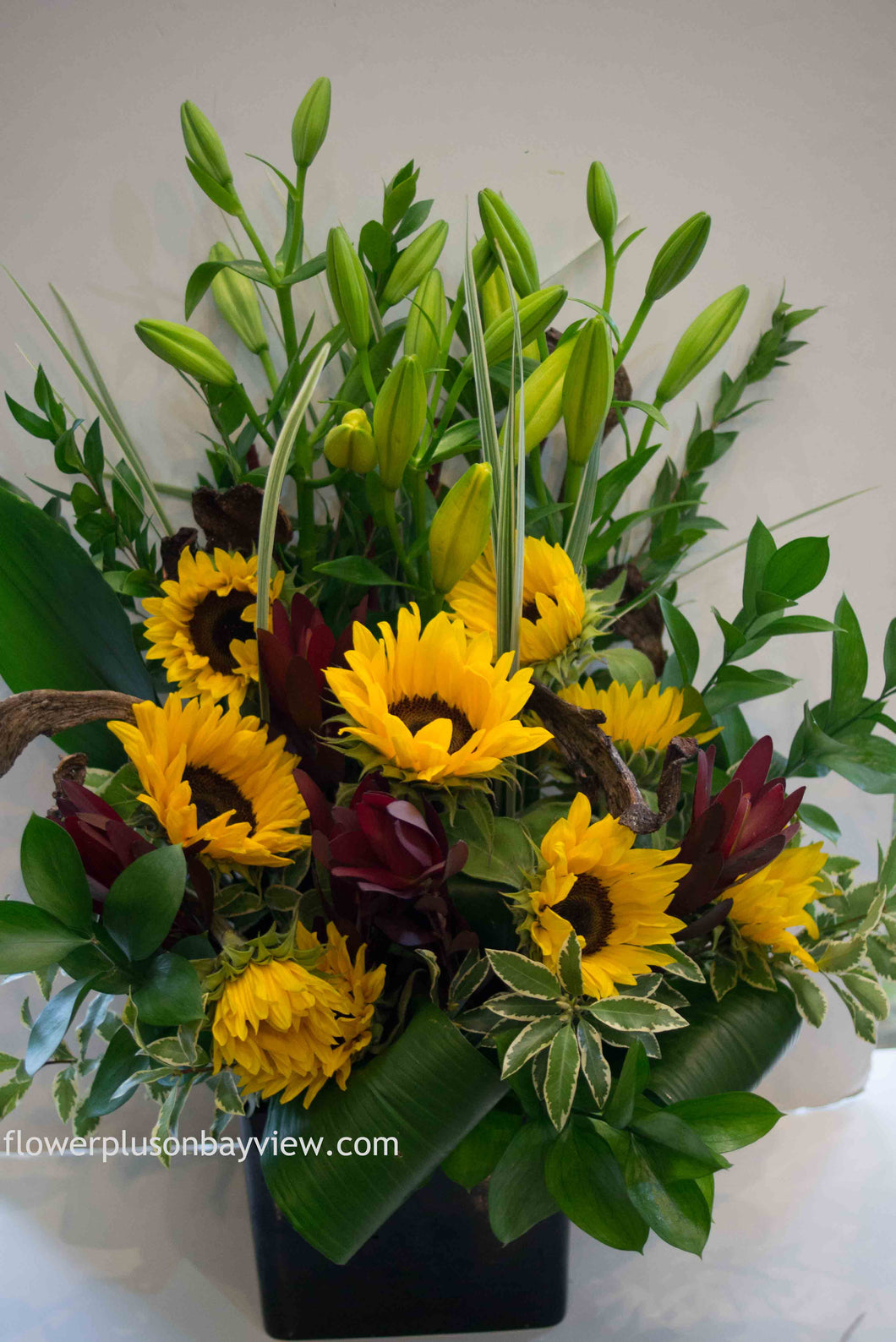 C36 - Vivid Sunflowers accented with Lilies - Flowerplustoronto
