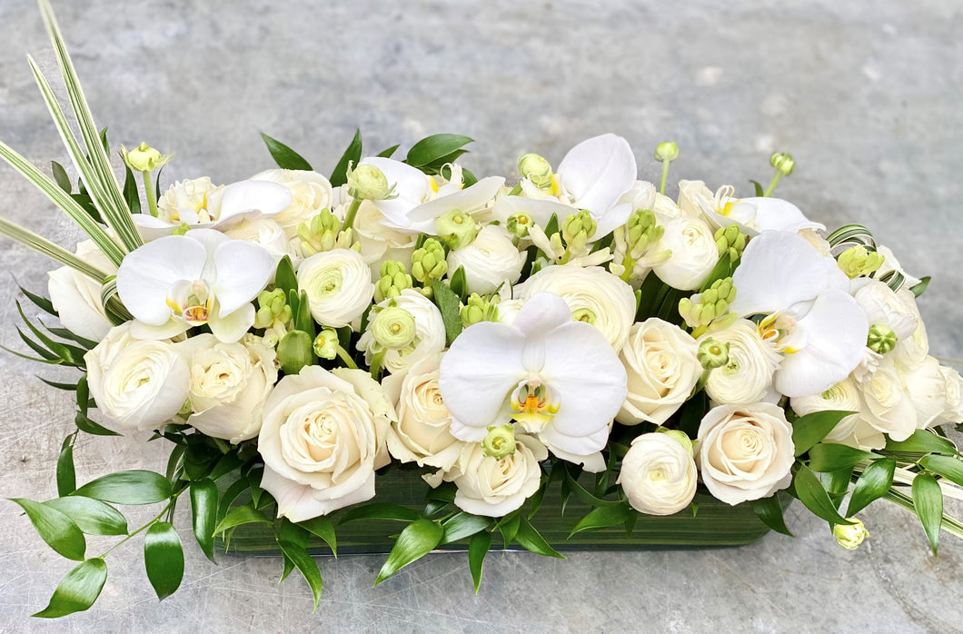 F106 - Modern White Rectangular Centerpiece accented with White Phalaenopsis - White hyacinth not available - Flowerplustoronto