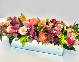 F134 - Classic Peaches, Corals and Burgundy Centerpiece (Flowers based on availability & Orchid colour based on availability - white, light pink or dark pink) - Flowerplustoronto