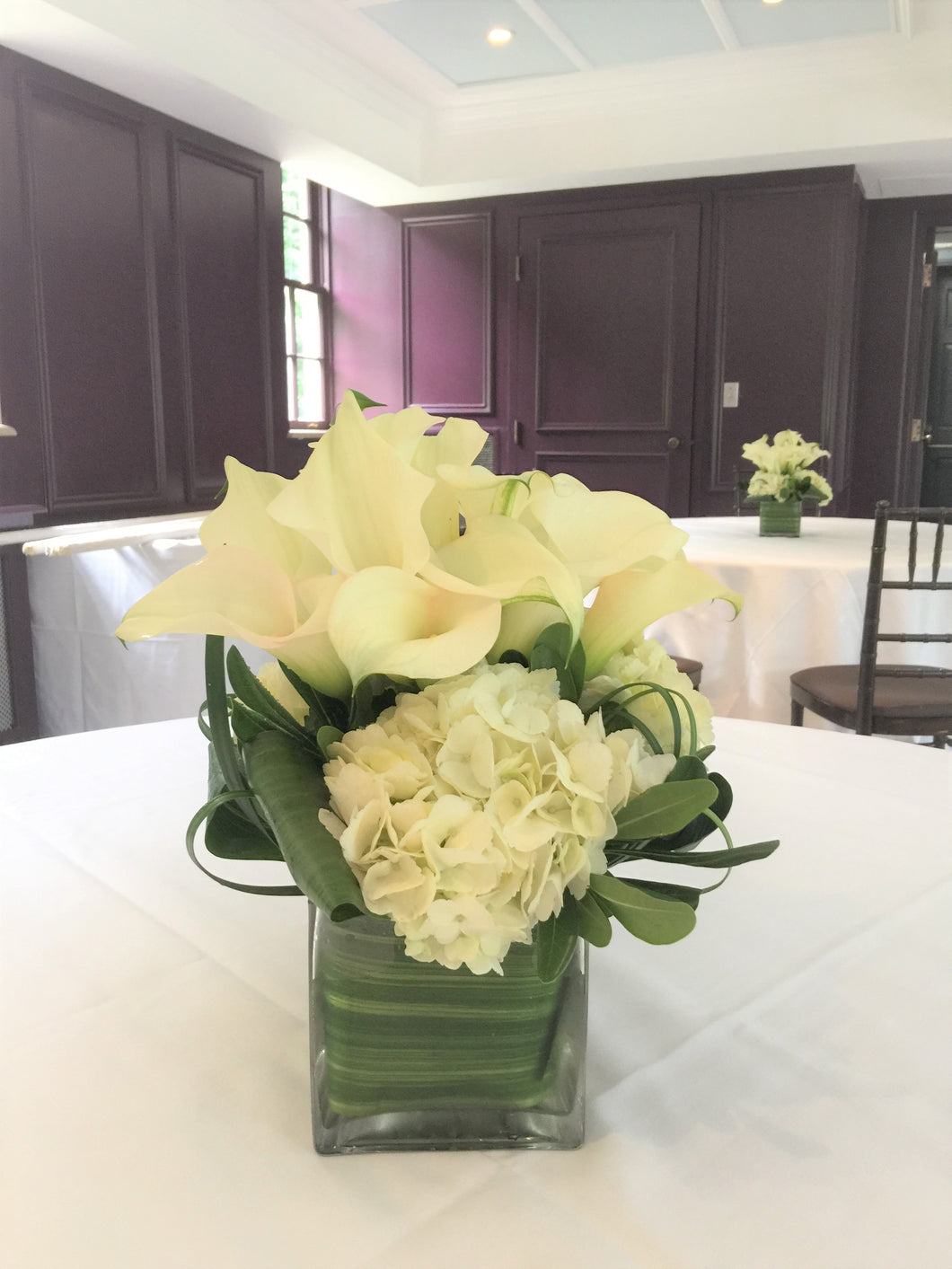 Modern Calla Lily and White Hydrangea Wedding - Guest table  Arrangements - Flowerplustoronto