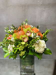 F163 - Modern Orange, White and Green Arrangement (Rose colour depending on availability)