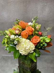F163 - Modern Orange, White and Green Arrangement (Rose colour depending on availability)
